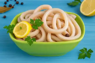Превью рецепта Маринованные кальмары в лимонном соке