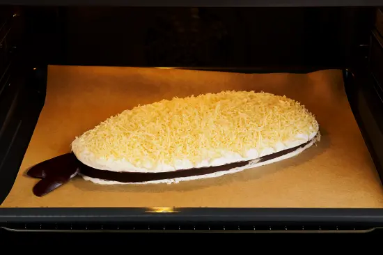 Карп запеченный по-кубански с сыром и помидорами - шаг 7 (изображение)