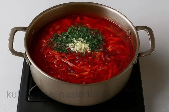 Борщ с курицей и капустой - шаг 7. Добавление зелени и чеснока